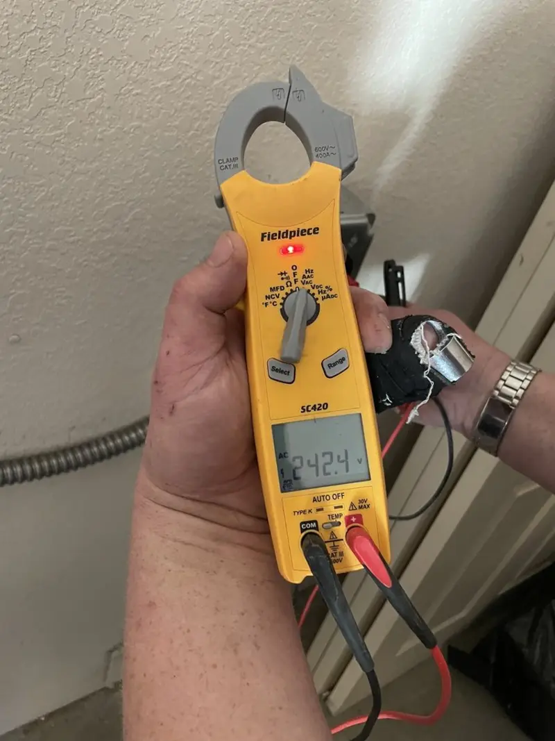 Voltage testing with clamp meter during Whole House Surge Protector in Springettsbury